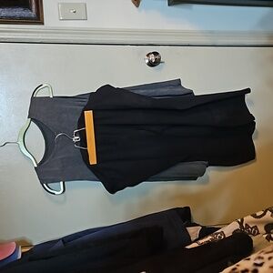 Black crop pants and grey top